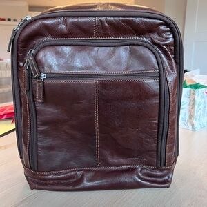 Jack George’s Brown Leather Backpack with laptop compartment.